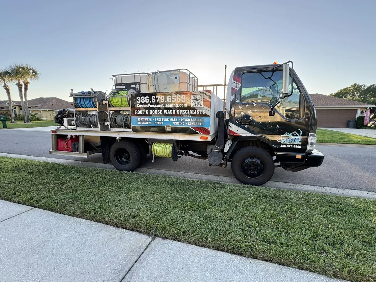 Costa's Pressure Cleaning wash truck loaded with hose reels, tanks and pressure washing equipment