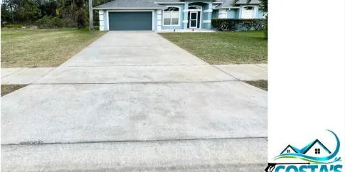 After: long concrete driveway, cleaned