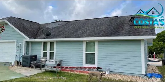 Before: light blue siding on a one-story home