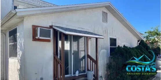Before: two-story home exterior