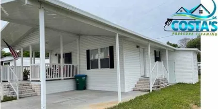Before: manufactured home porch and siding