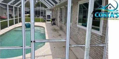 Before: pool deck inside a screen enclosure