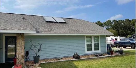 After: shingle roof on a one-story home, cleaned