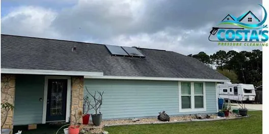 Before: shingle roof on a one-story home