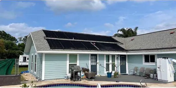 After: shingle roof with solar panels, cleaned