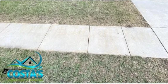 After: dirty sidewalk with COSTA written in the grime, cleaned