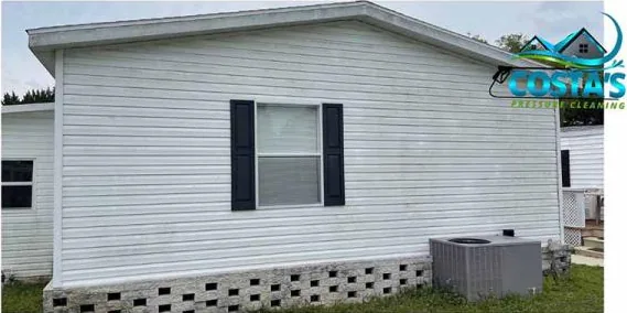 Before: vinyl siding end wall
